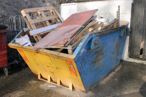 Waste collection trucks navigating Central London streets