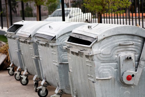 Waste collection workers sorting recyclables